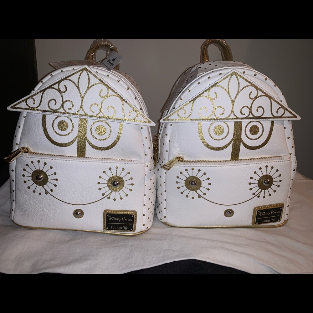 1 Disneyland it’s a small world loungefly backpack